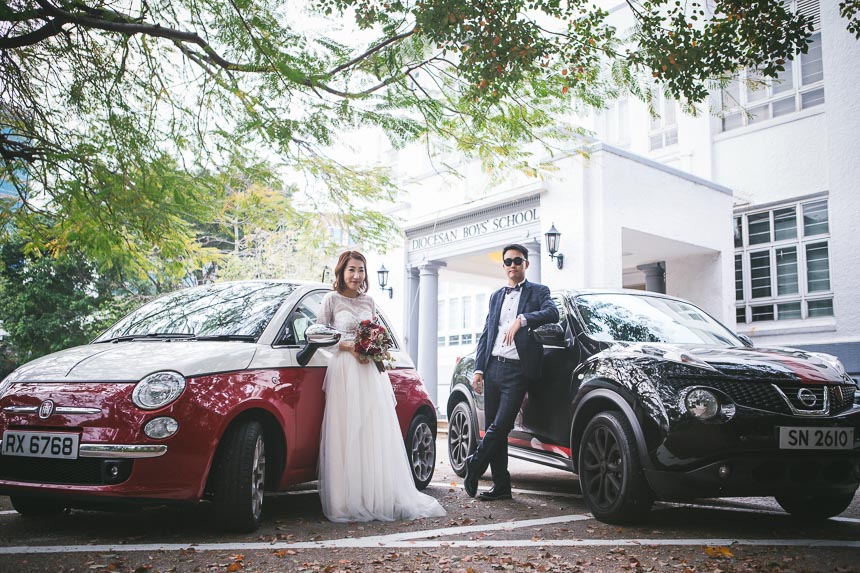behind the scenes video bride and groom posing on their pre wedding shoot