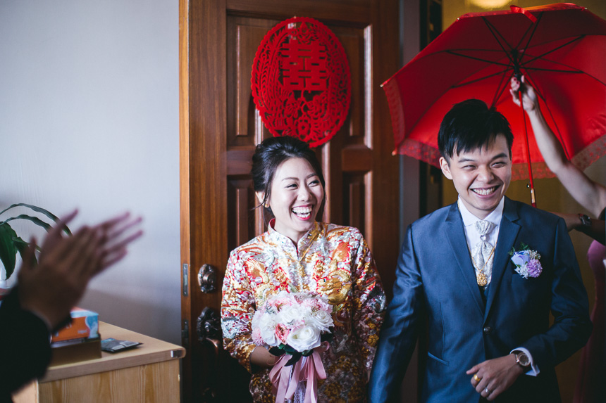 bride and groom kissing during their royal garden hotel wedding